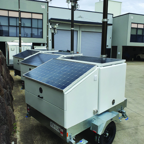 A CCTV camera trailer with solar panel and pole